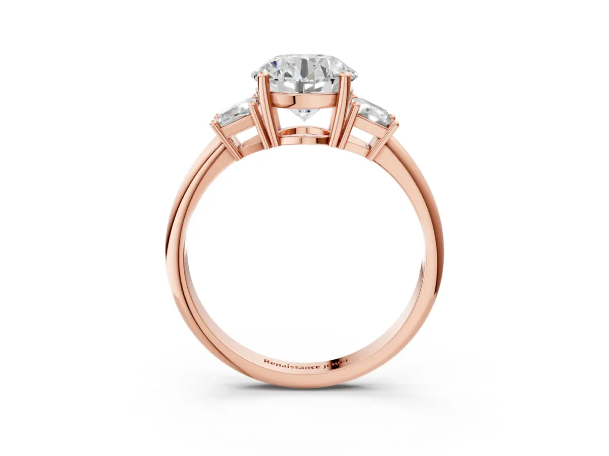 Round Cut Diamond Three-Stone Ring with Trapezoid Side Stones and Prong Setting Rose gold
