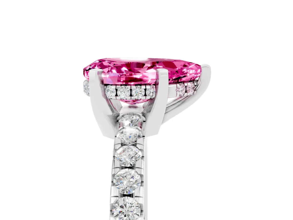 Pear Cut Pink Sapphire Solitaire Ring with Round Pavé Band and Four-Prong Setting Silver
