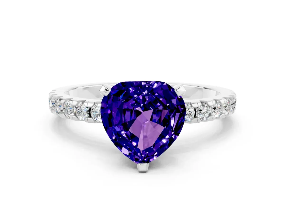 Heart Cut Tanzanite Solitaire Ring with Round Pavé Band and Four-Prong Setting Silver