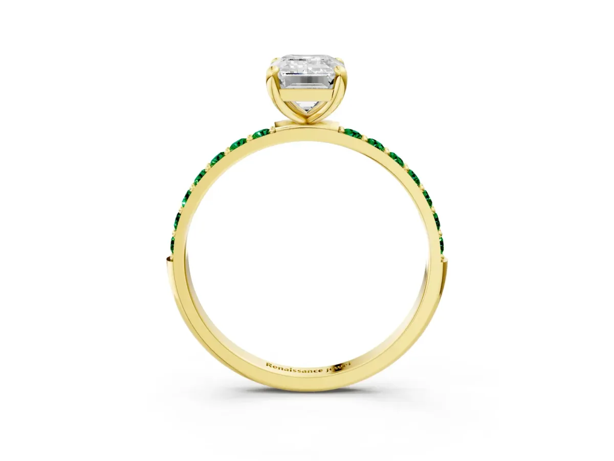 Emerald Cut Diamond Solitaire Ring with Round Emerald Pavé Band and Prong Setting Yellow gold