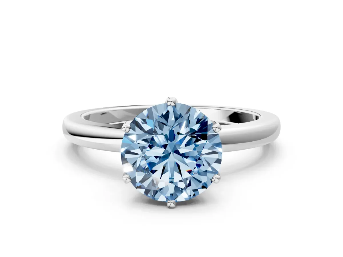 Fancy Blue Round Cut Solitaire Diamond Ring with Six-Prong Setting on a Classic Band White gold