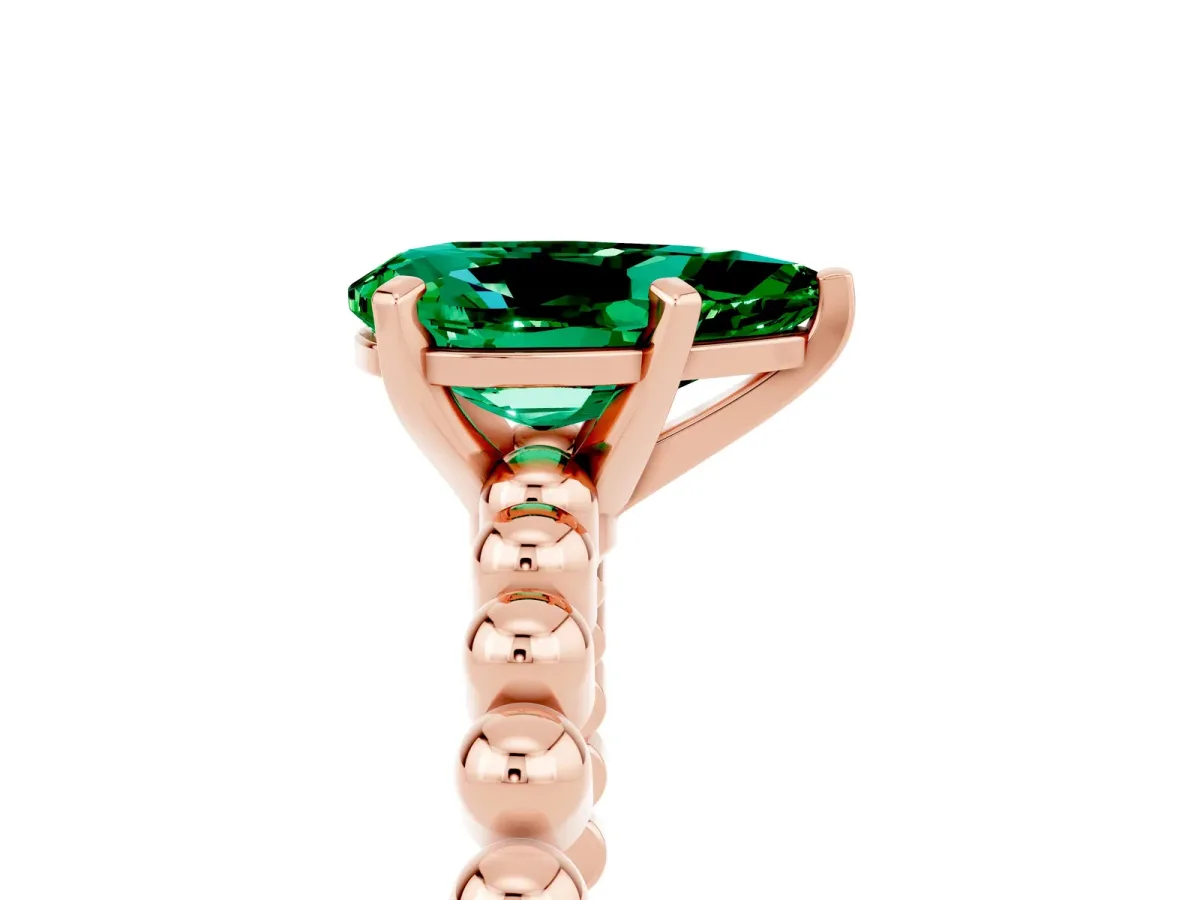 Pear Cut Emerald Solitaire Ring with Beaded Band and Prong Setting Rose gold
