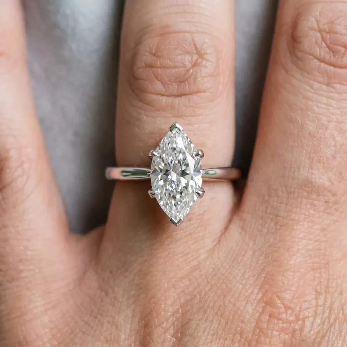 Marquise Cut Diamond Solitaire Ring with Flower Prong Setting and Classic Band Silver