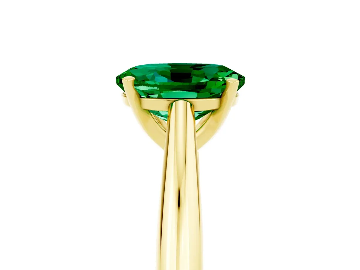 Oval Cut Emerald Solitaire Engagement Ring with Cathedral Setting and Four-Prong Mount Yellow gold
