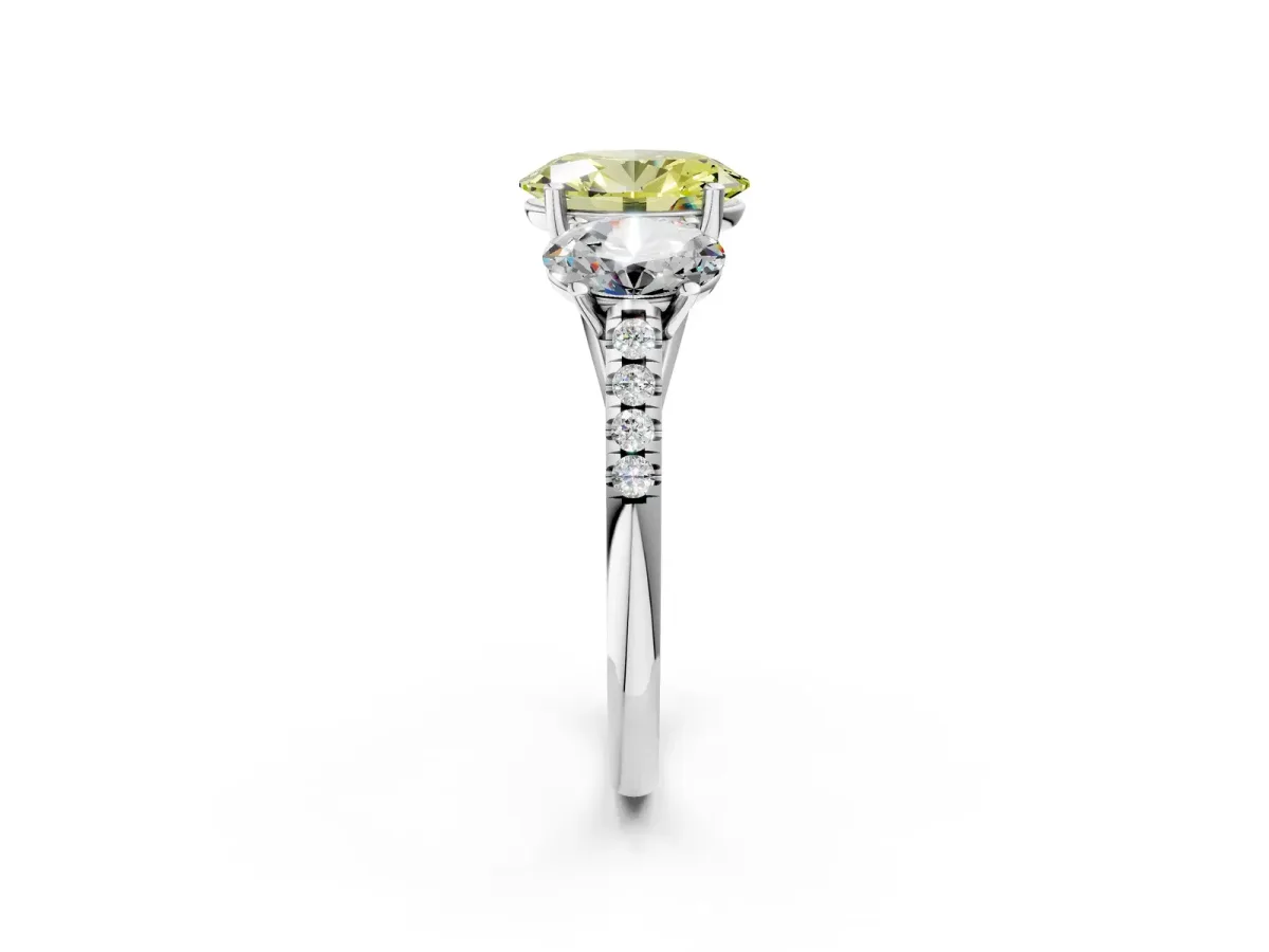Fancy Yellow Three-Stone Oval Cut Diamond Ring with Round Pavé Band and Prong Setting Silver
