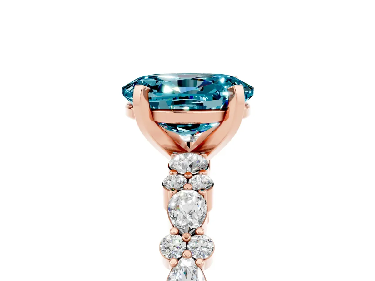 Oval Cut Blue Topaz Side Stone Solitaire Ring with Round and Four-Prong Setting Rose gold