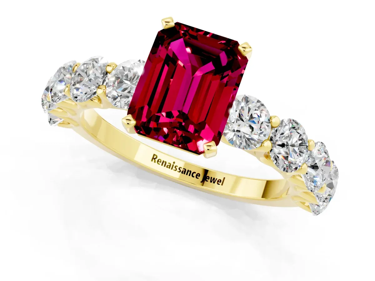 Emerald Cut Garnet Prong Setting with Side Stones on a Pave Band Yellow gold