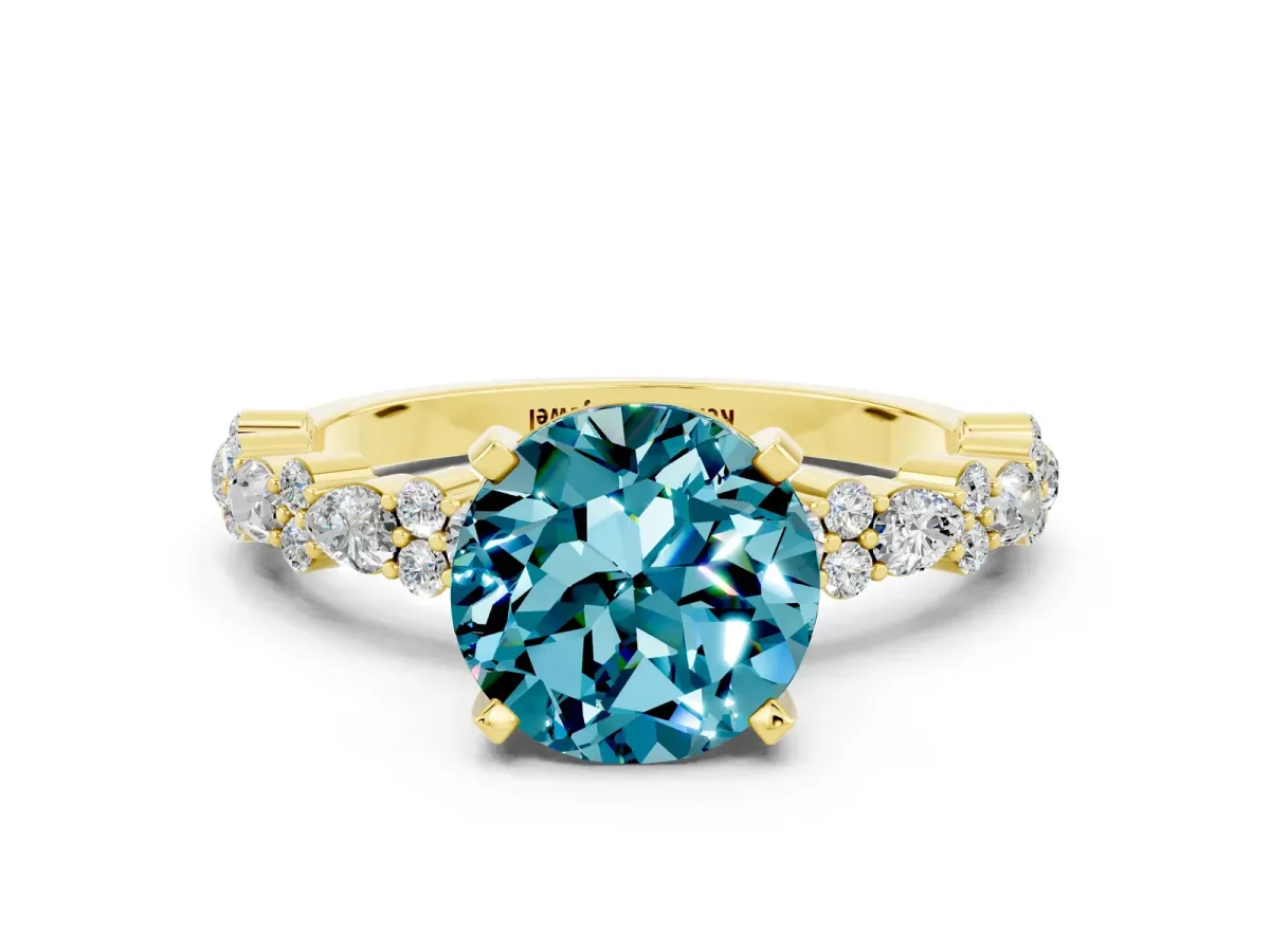 Round Cut Blue Topaz Side Stone Solitaire Ring with Round and Four-Prong Setting Yellow gold
