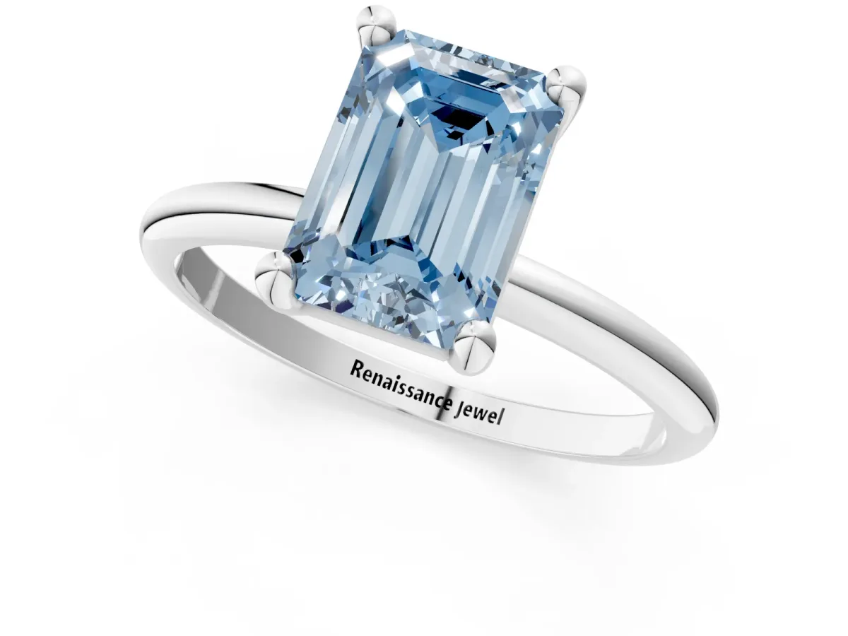 Fancy Blue Emerald Cut Solitaire Diamond Ring with 4-Prong Setting on a Classic Band Silver