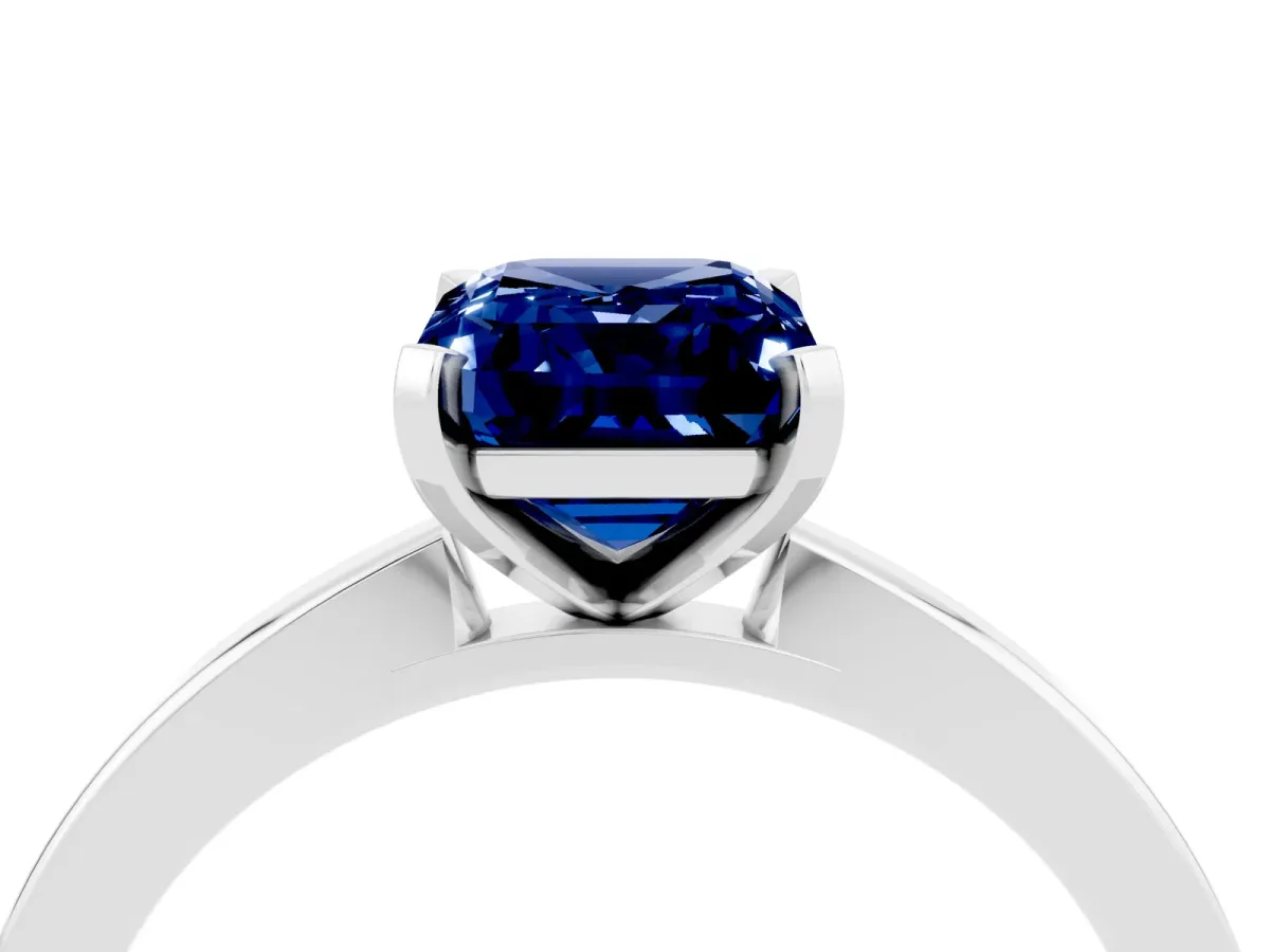 Emerald Cut Blue Sapphire Solitaire Engagement Ring with Classic Band and Four-Prong Setting Silver