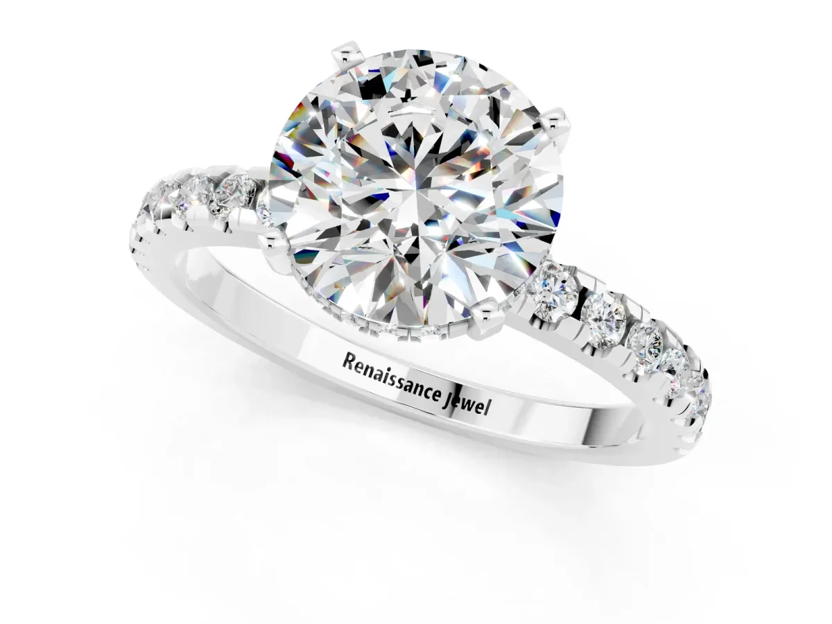 Round Cut Moissanite Solitaire Ring with Round Pavé Band and Four-Prong Setting Silver
