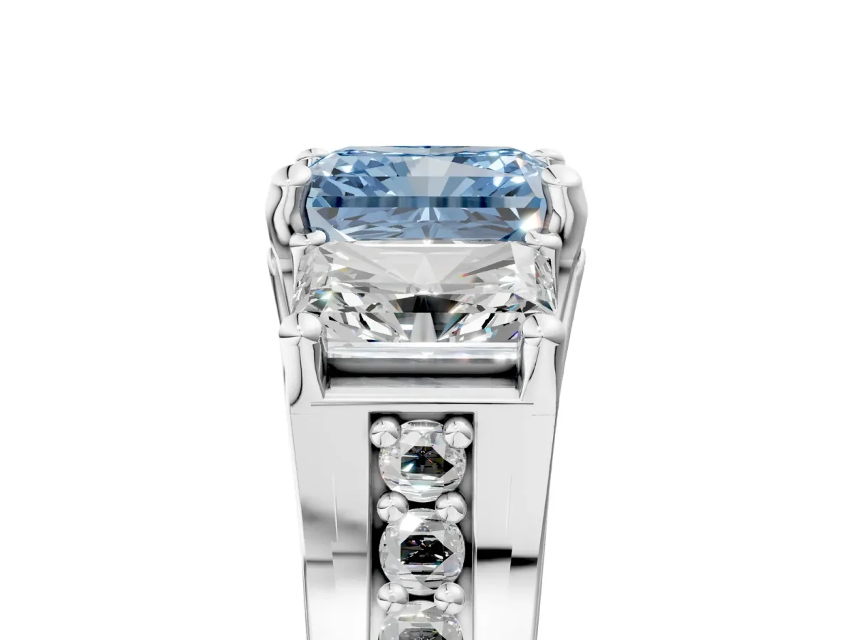 Fancy Blue Radiant Cut Diamond Three-Stone Ring with Channel Set Band and Four-Prong Setting Platinum