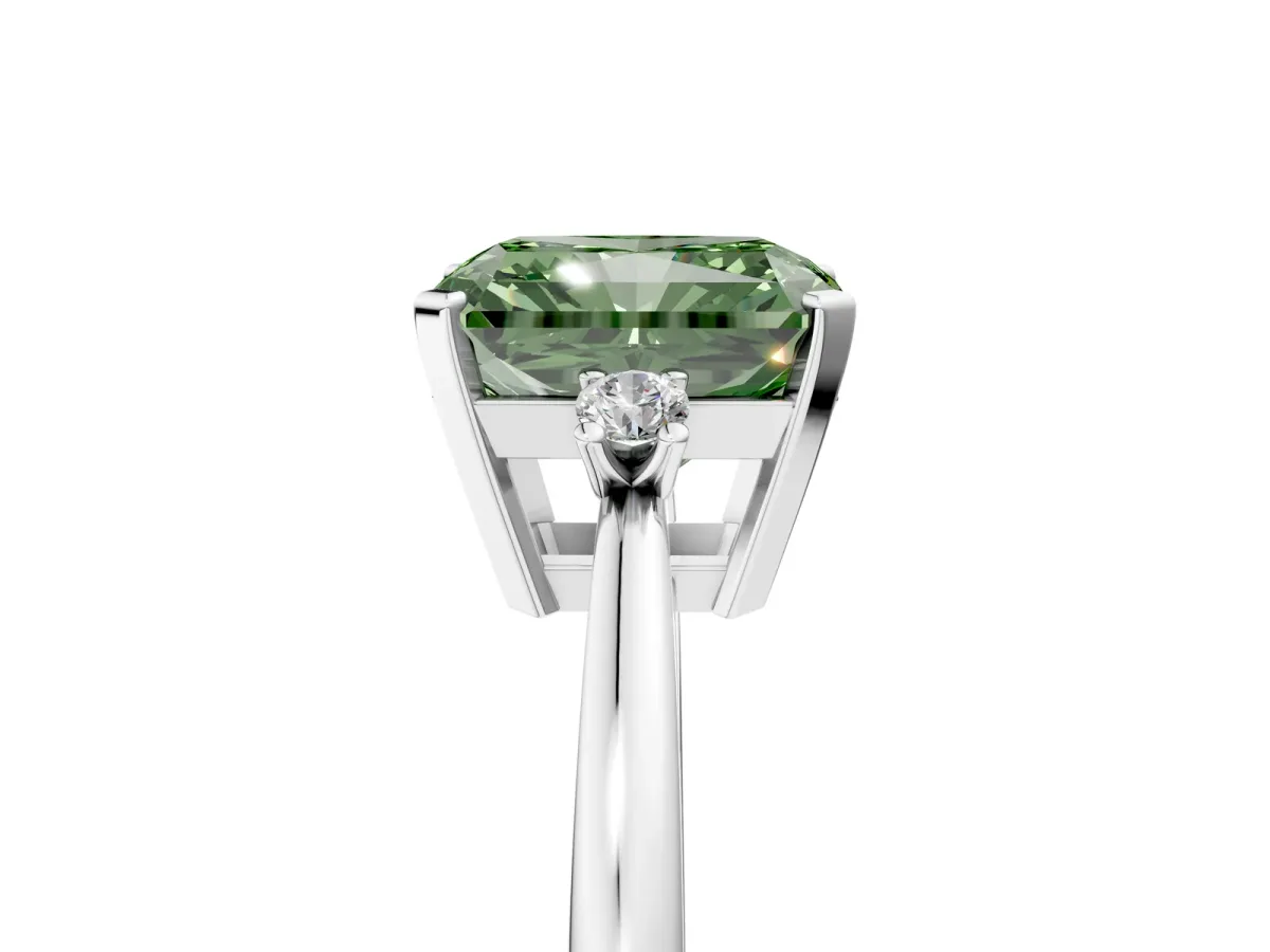 Fancy Green Radiant Cut Cut Three-Stone Solitaire Ring with Round Accent Diamonds and Four-Prong Setting Platinum
