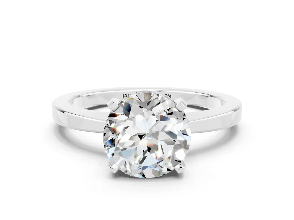Round Cut Moissanite Solitaire Engagement Ring with Classic Band and Four-Prong Setting Silver