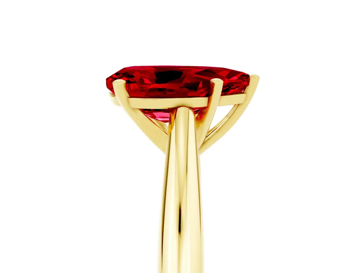 Pear Cut Ruby Solitaire Engagement Ring with Cathedral Setting and Four-Prong Mount Yellow gold
