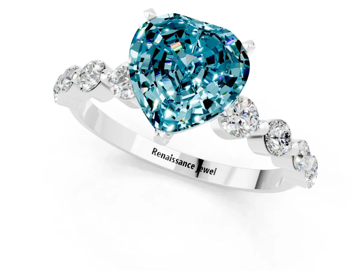 Heart Cut Solitaire Blue Topaz Ring with Pave Band and Four-Prong Setting Silver