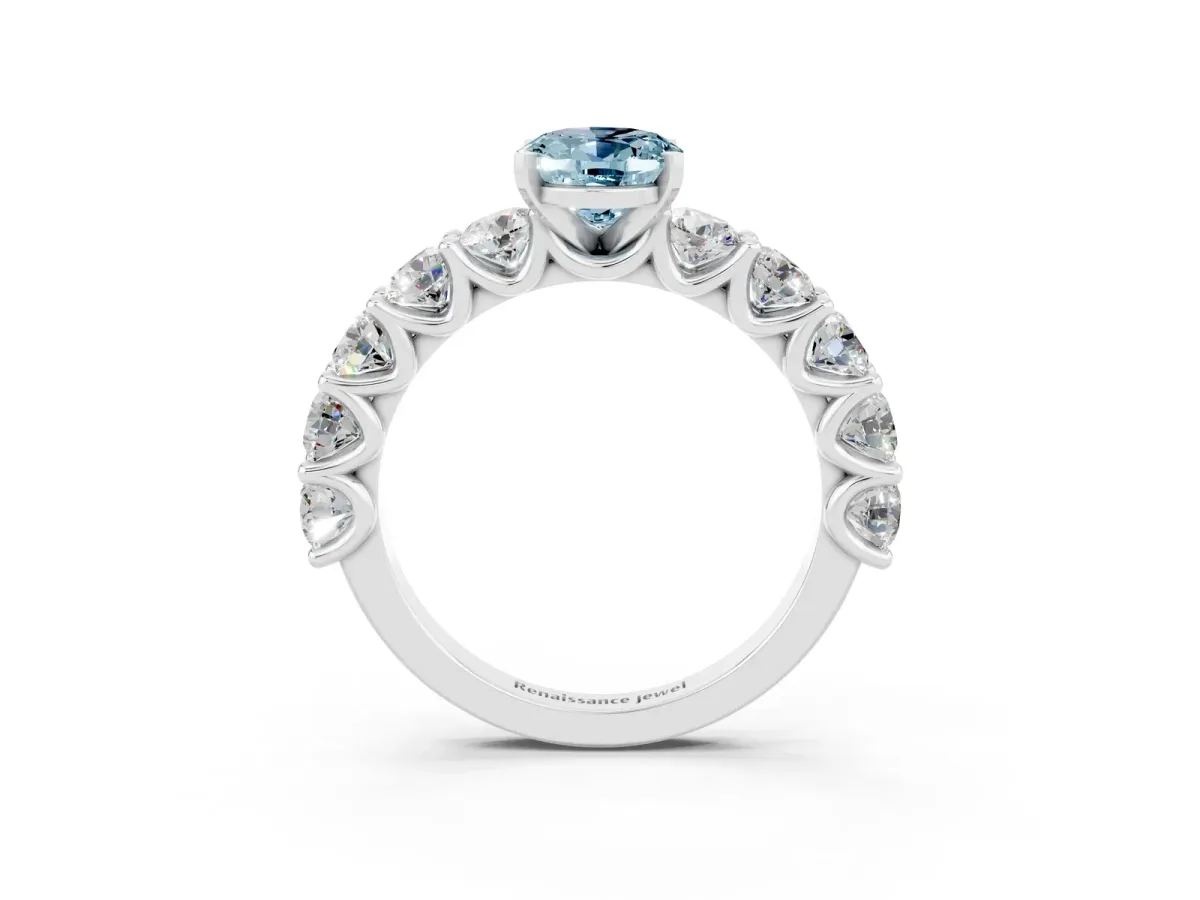 Oval Cut Aquamarine Prong Setting with Side Stones on a Pave Band Silver