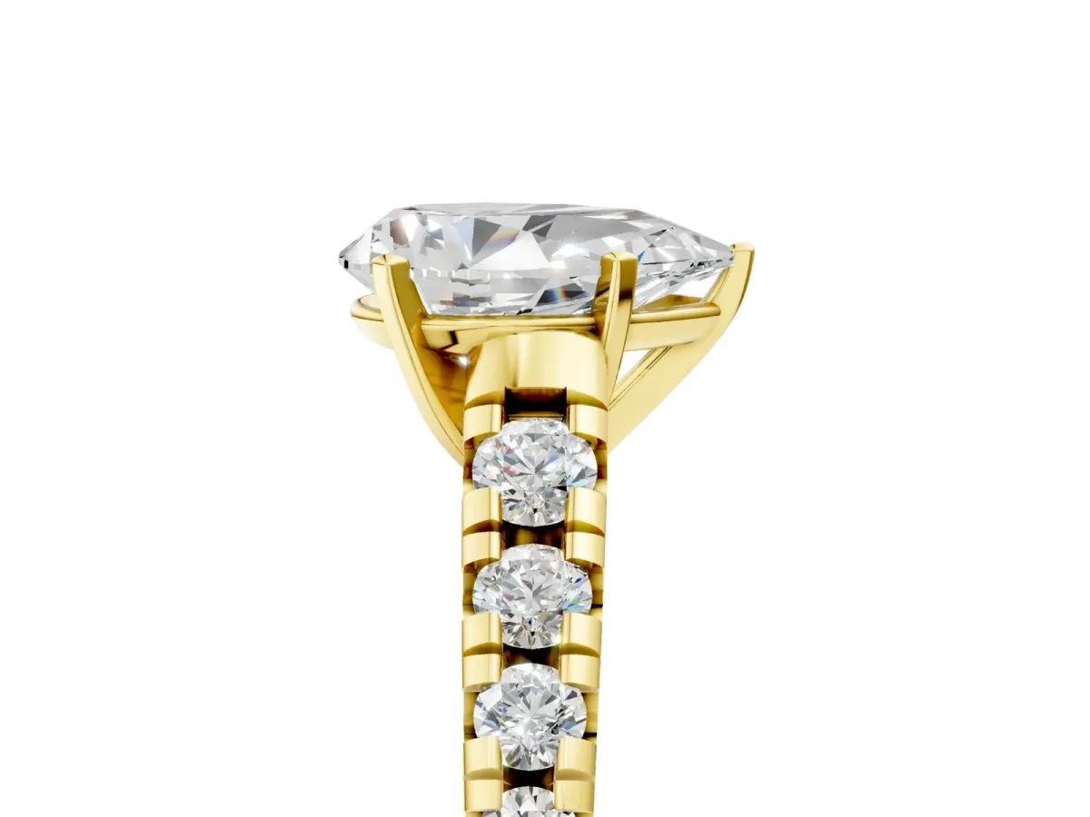 Pear Cut Diamond Cathedral Solitaire Ring with Round Pavé Band Yellow gold