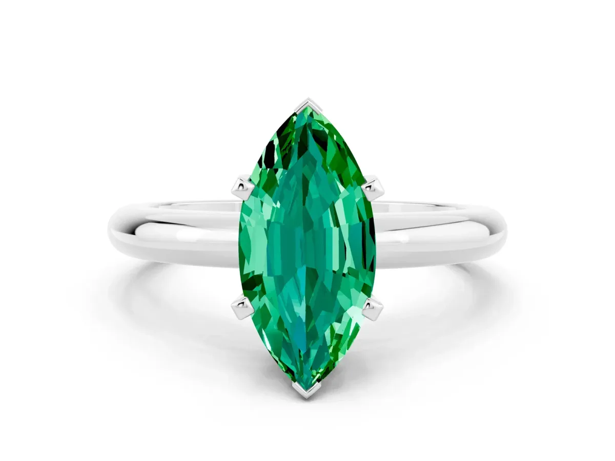 Marquise Cut Emerald Solitaire Engagement Ring with Round Band and Four-Prong Setting Silver