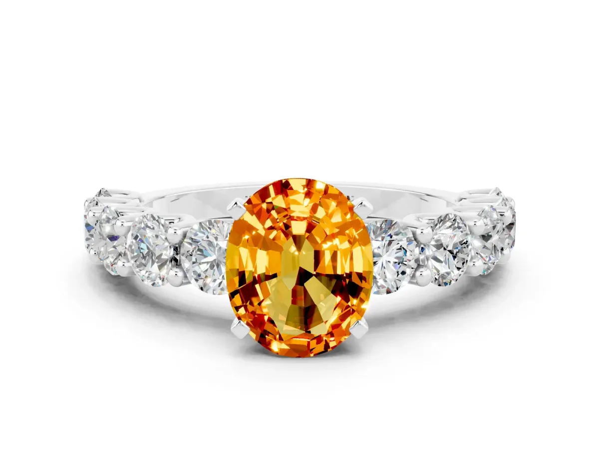 Oval Cut Citrine Prong Setting with Side Stones on a Pave Band Platinum