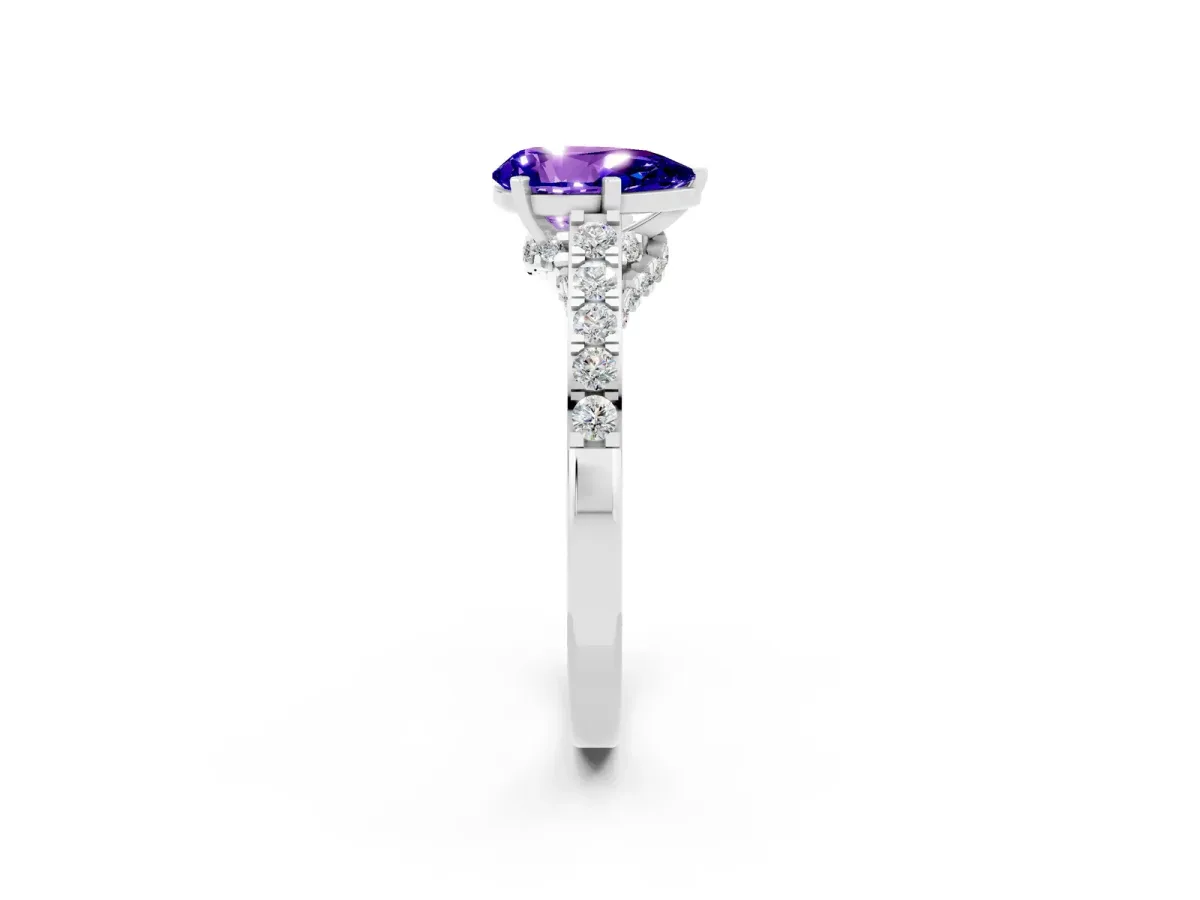 Pear Cut Tanzanite Solitaire Ring with Crossover Gallery and Round Pavé Band Silver