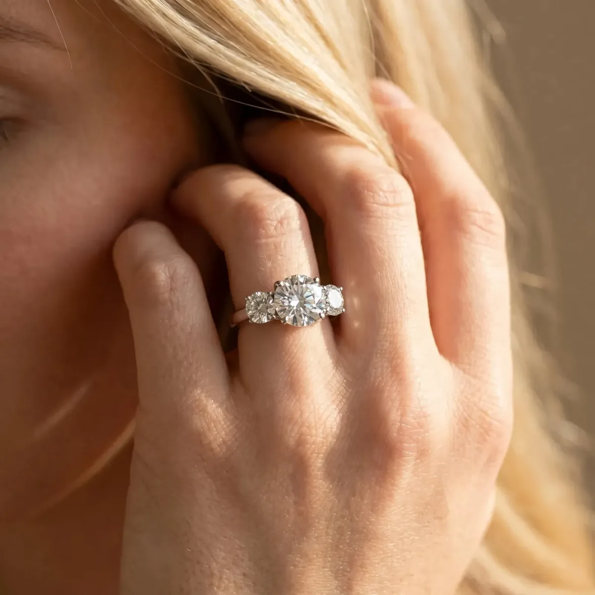 Three-Stone Asscher Cut Cut Diamond Engagement Ring with Prong Setting on a White Gold Band Silver