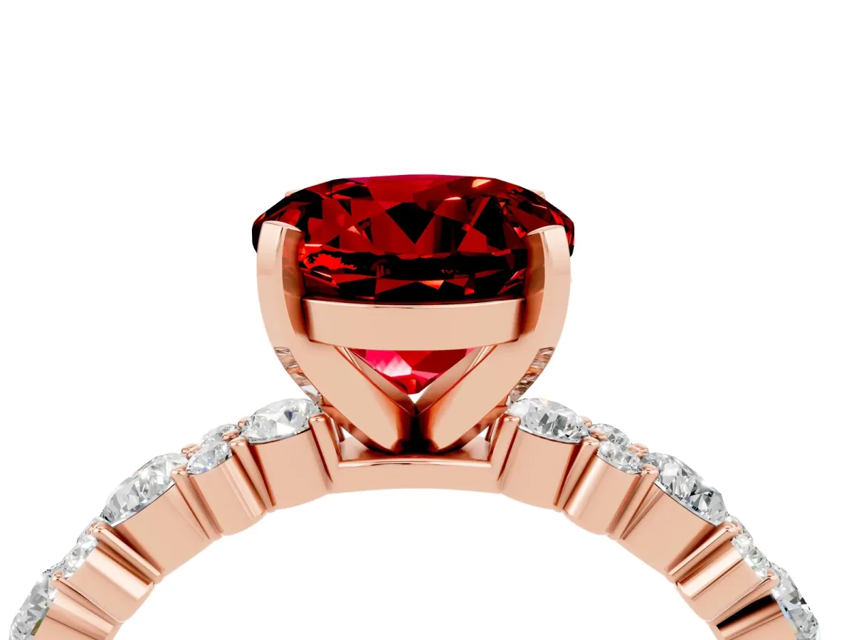 Round Cut Ruby Side Stone Solitaire Ring with Round and Four-Prong Setting Rose gold
