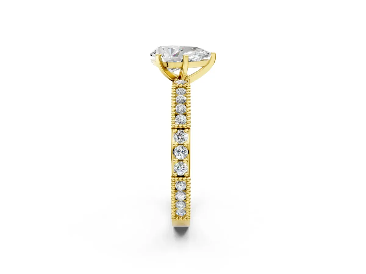 Pear Cut Solitaire with Pavé Band and Four-Prong Setting Yellow gold