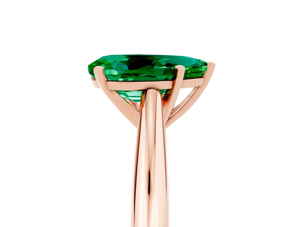 Pear Cut Emerald Solitaire Engagement Ring with Cathedral Setting and Four-Prong Mount Rose gold