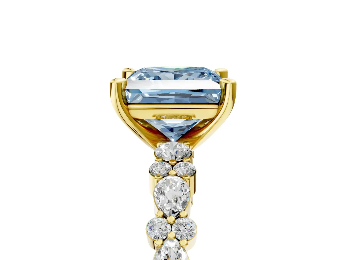 Fancy Blue Princess Cut Diamond Side Stone Solitaire Ring with Round and Four-Prong Setting Yellow gold