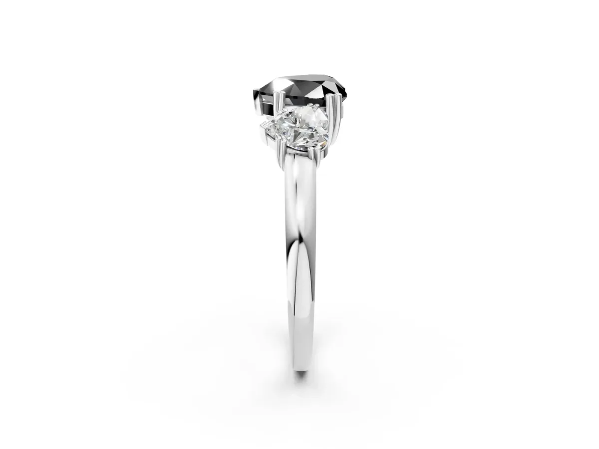 Fancy Black Three-Stone Heart Cut Cut Diamond Ring with Channel Set Band and Four-Prong Setting Silver