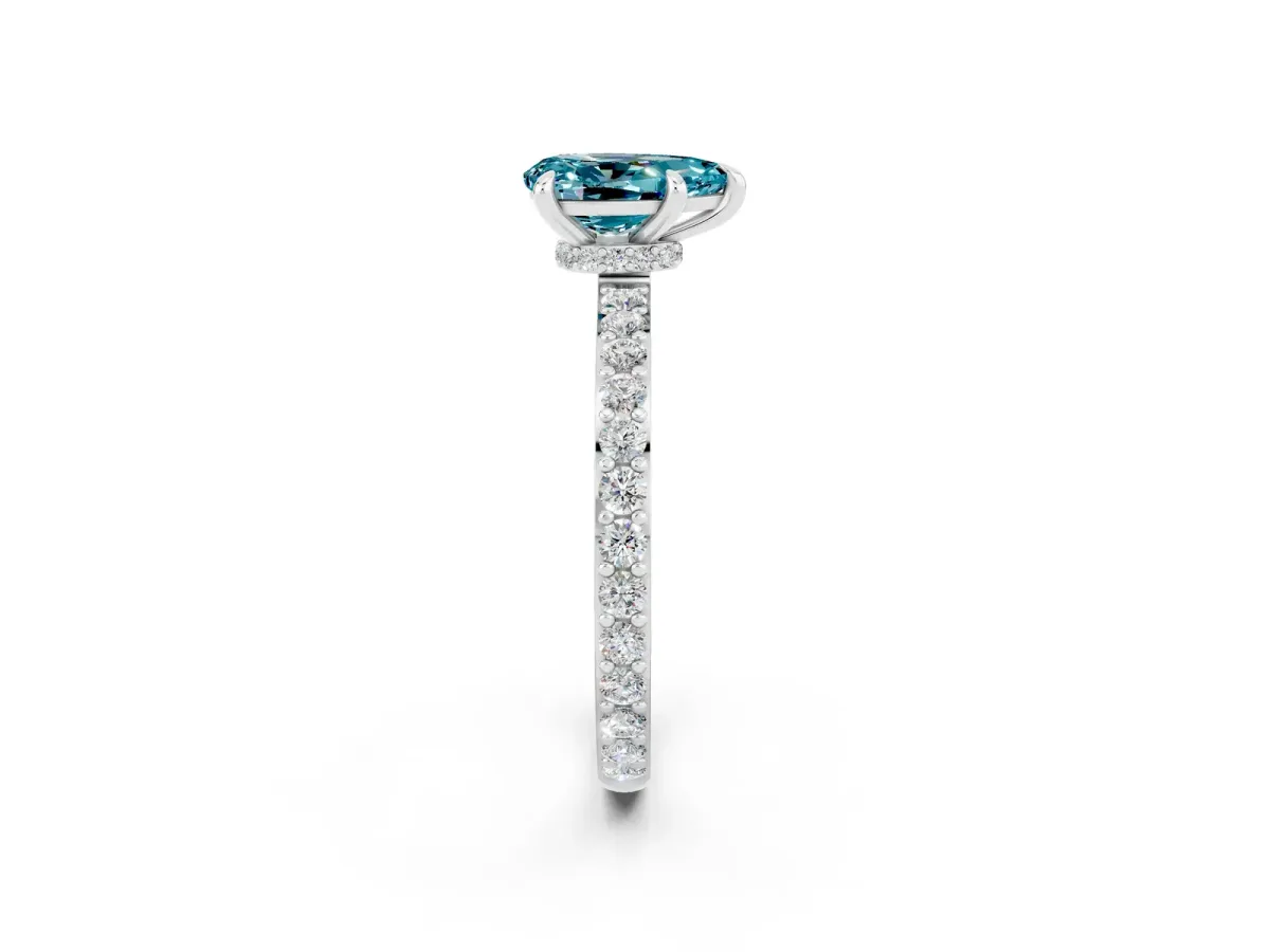 Pear Cut Blue Topaz Solitaire Engagement Ring with Pavé Band and Four-Prong Setting Silver