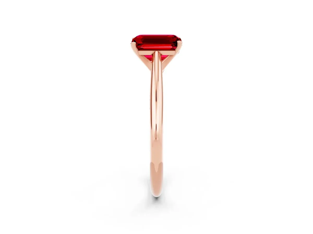 Emerald Cut Ruby Solitaire Engagement Ring with Cathedral Setting and Four-Prong Mount Rose gold
