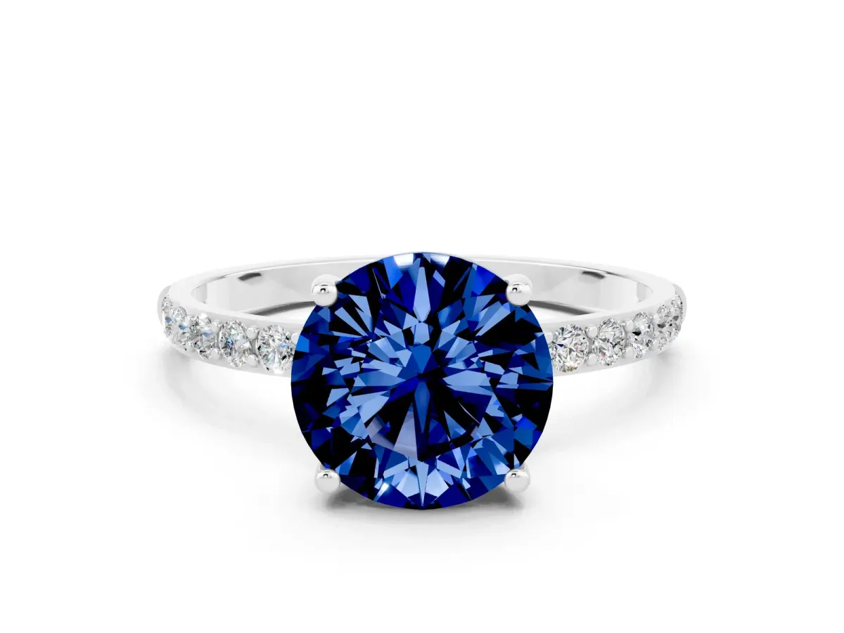 Round Cut Blue Sapphire Solitaire Ring with Round Pavé Band and Prong Setting Silver