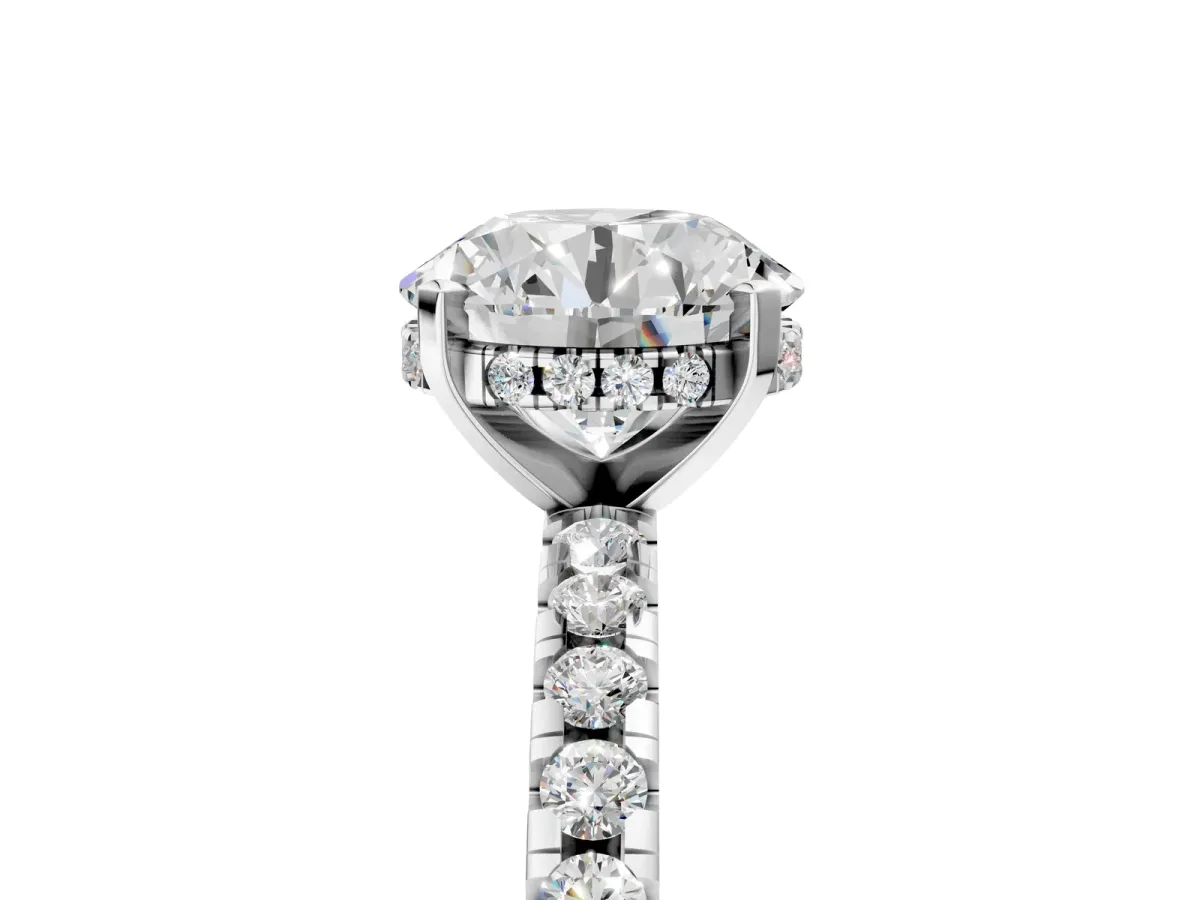Round Cut Diamond Solitaire Ring with Round Pavé Band and Four-Prong Setting Silver