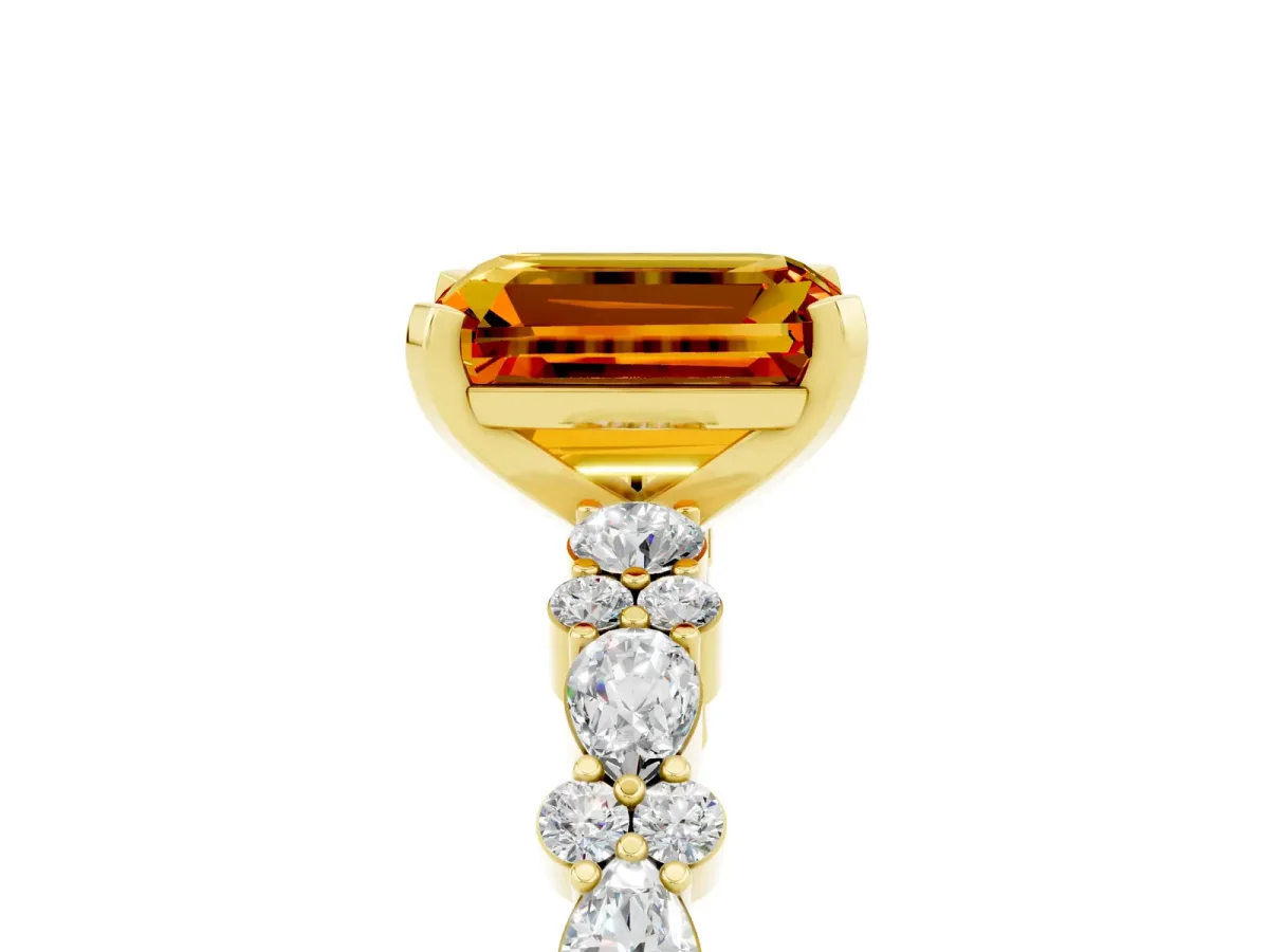 Emerald Cut Citrine Side Stone Solitaire Ring with Round and Four-Prong Setting Yellow gold