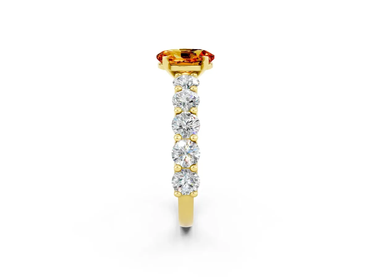 Oval Cut Citrine Prong Setting with Side Stones on a Pave Band Yellow gold