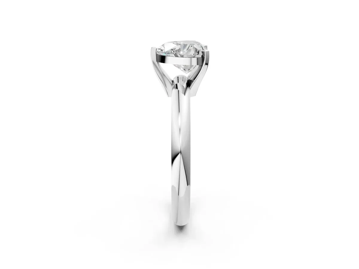 Heart Cut Diamond Solitaire Engagement Ring with Round Band and Four-Prong Setting Silver