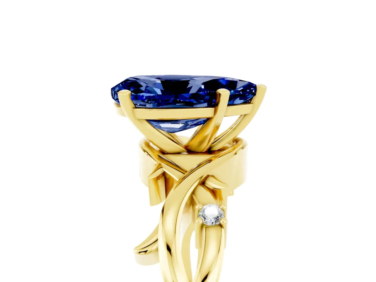 Pear Cut Blue Sapphire Solitaire Ring with Twisted Band and Prong Setting Yellow gold