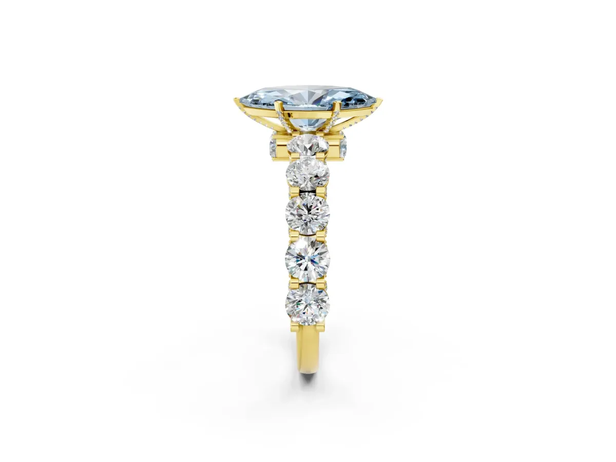 Fancy Blue Marquise Cut Diamond Side Stone Engagement Ring with Four-Prong Setting Yellow gold