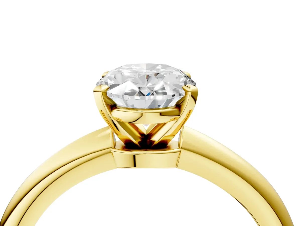 Oval Cut Diamond Solitaire Ring with Six-Prong Setting and Classic Band Yellow gold