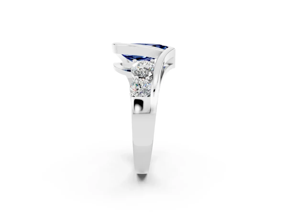 Bezel Set Pear Cut Blue Sapphire Bypass Ring with Round Accents Silver