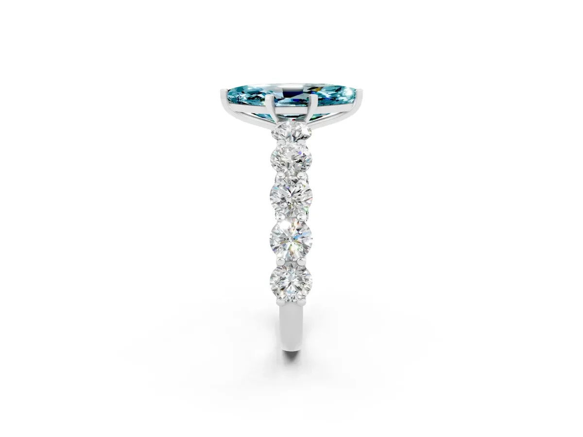 Marquise Cut Blue Topaz Prong Setting with Side Stones on a Pave Band Silver
