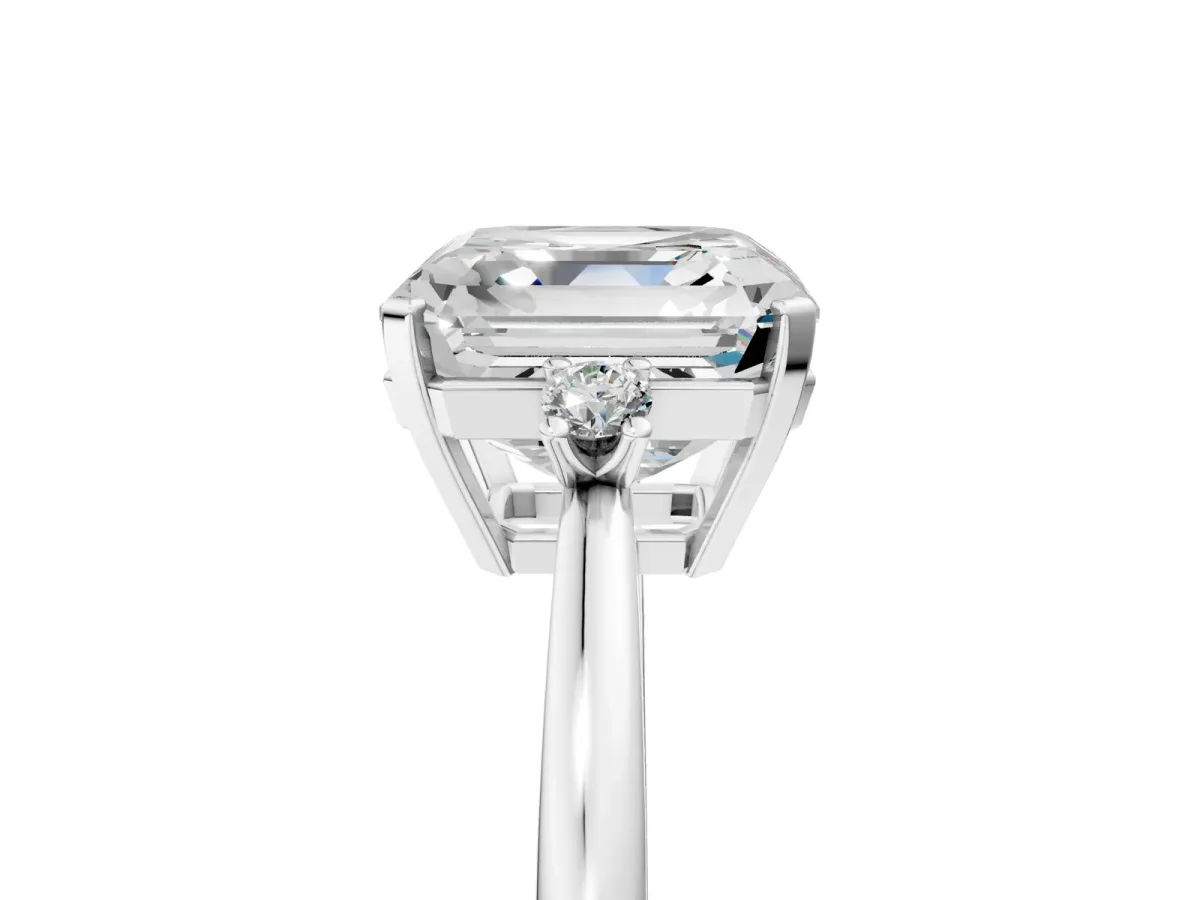 Asscher Cut Cut Three-Stone Solitaire Ring with Round Accent Diamonds and Four-Prong Setting Platinum
