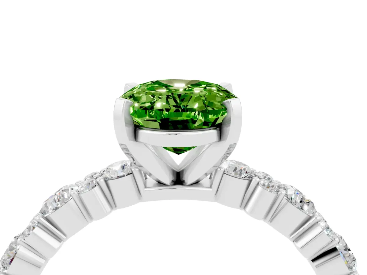 Oval Cut Peridot Side Stone Solitaire Ring with Round and Four-Prong Setting White gold