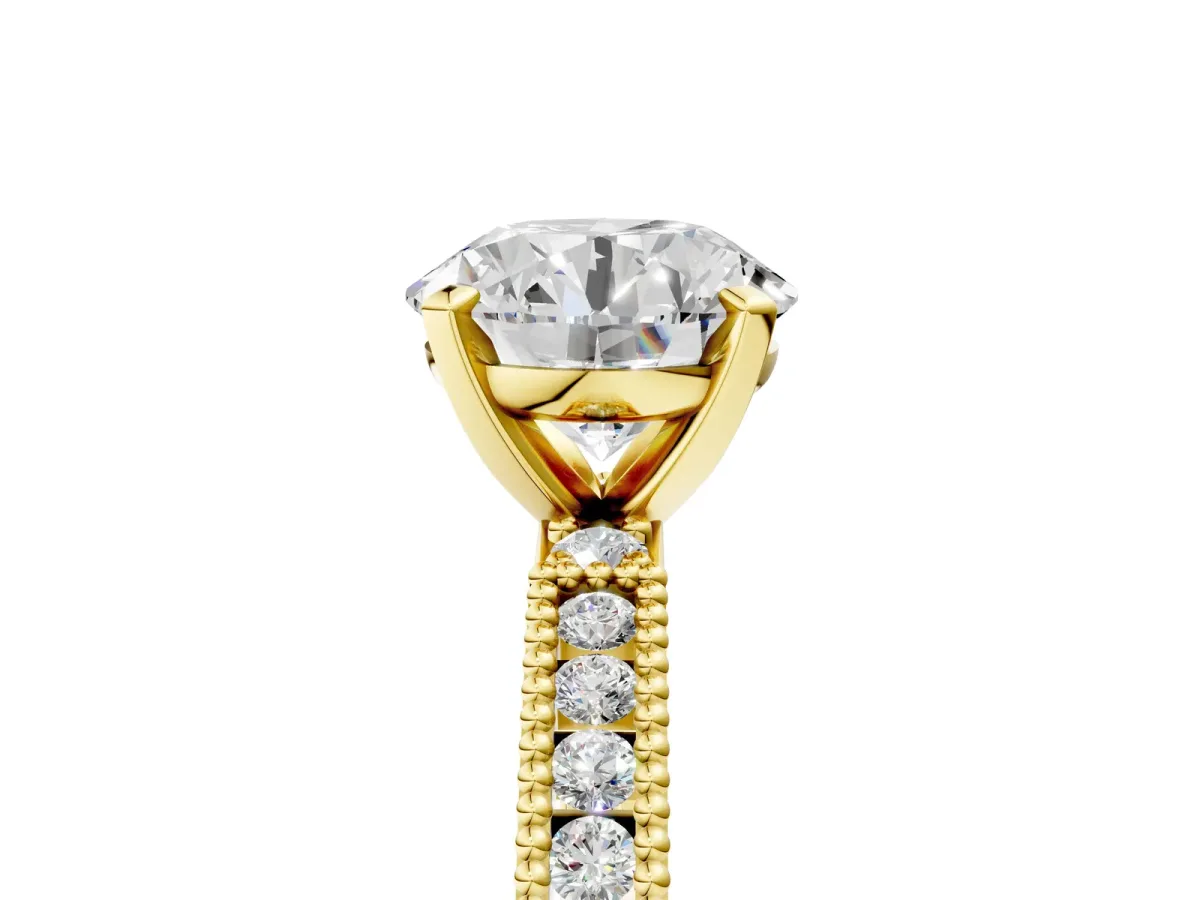 Round Cut Solitaire with Pavé Band and Four-Prong Setting Yellow gold