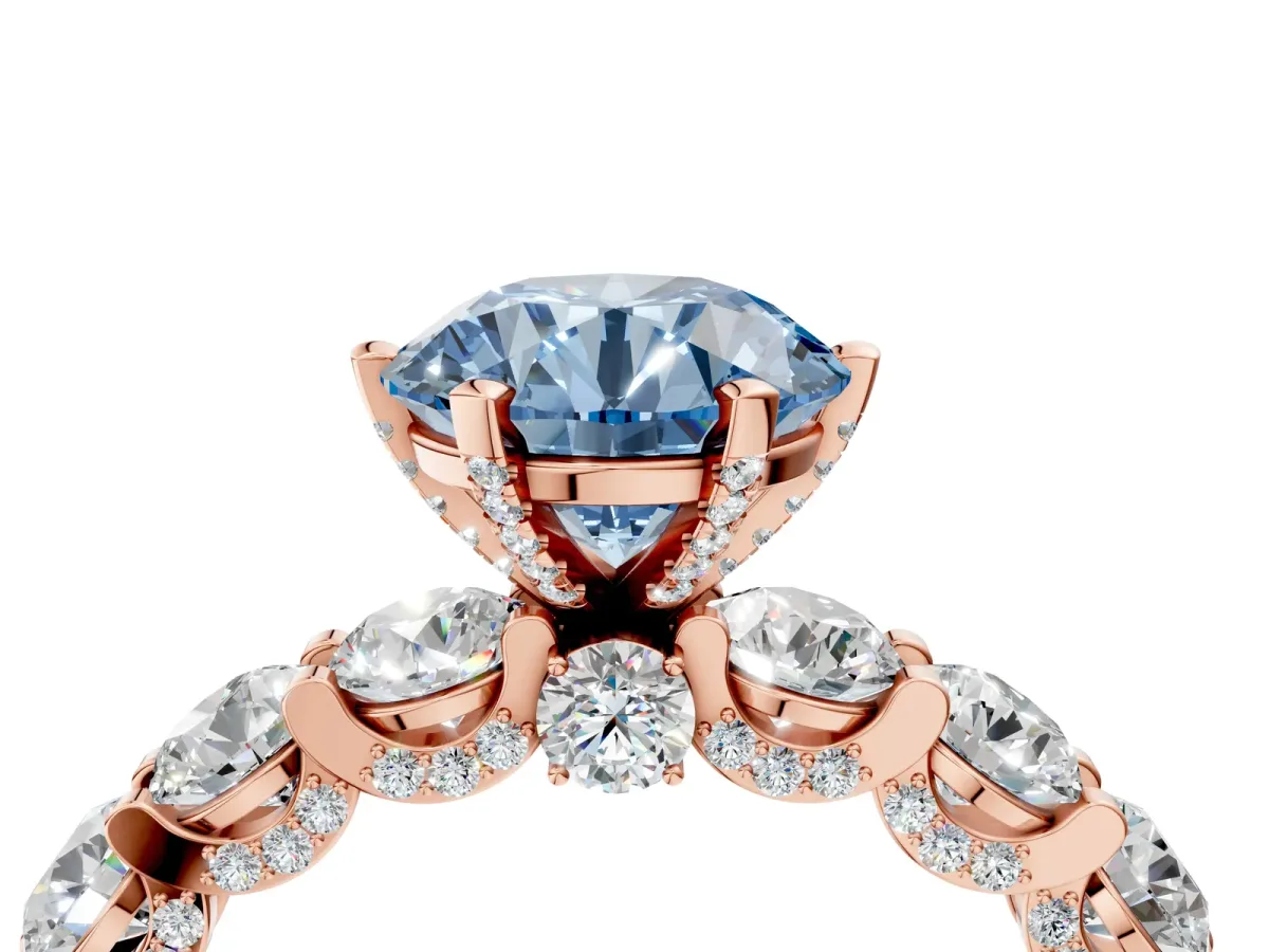 Fancy Blue Round Cut Diamond Side Stone Engagement Ring with Four-Prong Setting Rose gold