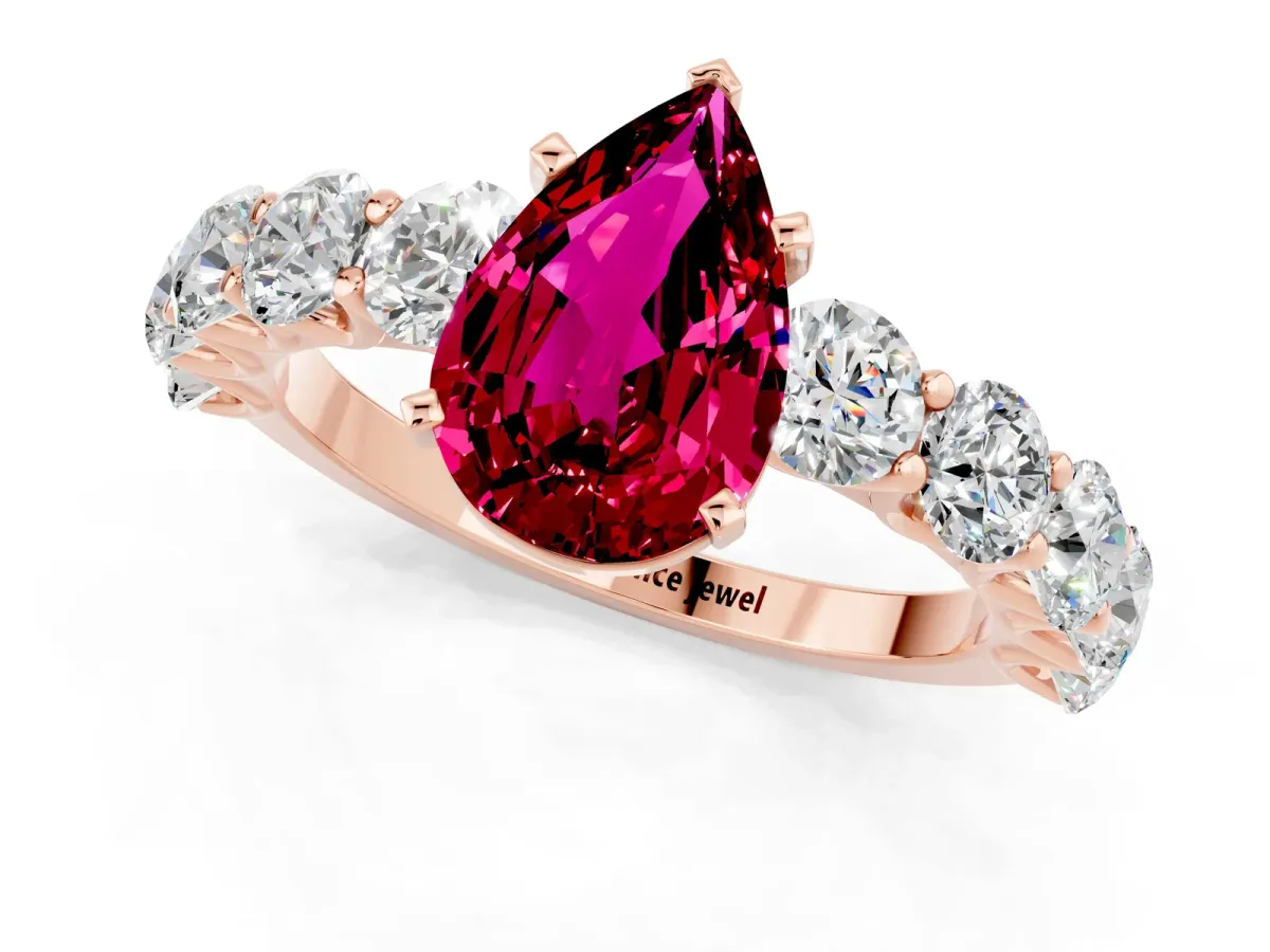 Pear Cut Garnet Prong Setting with Side Stones on a Pave Band Rose gold