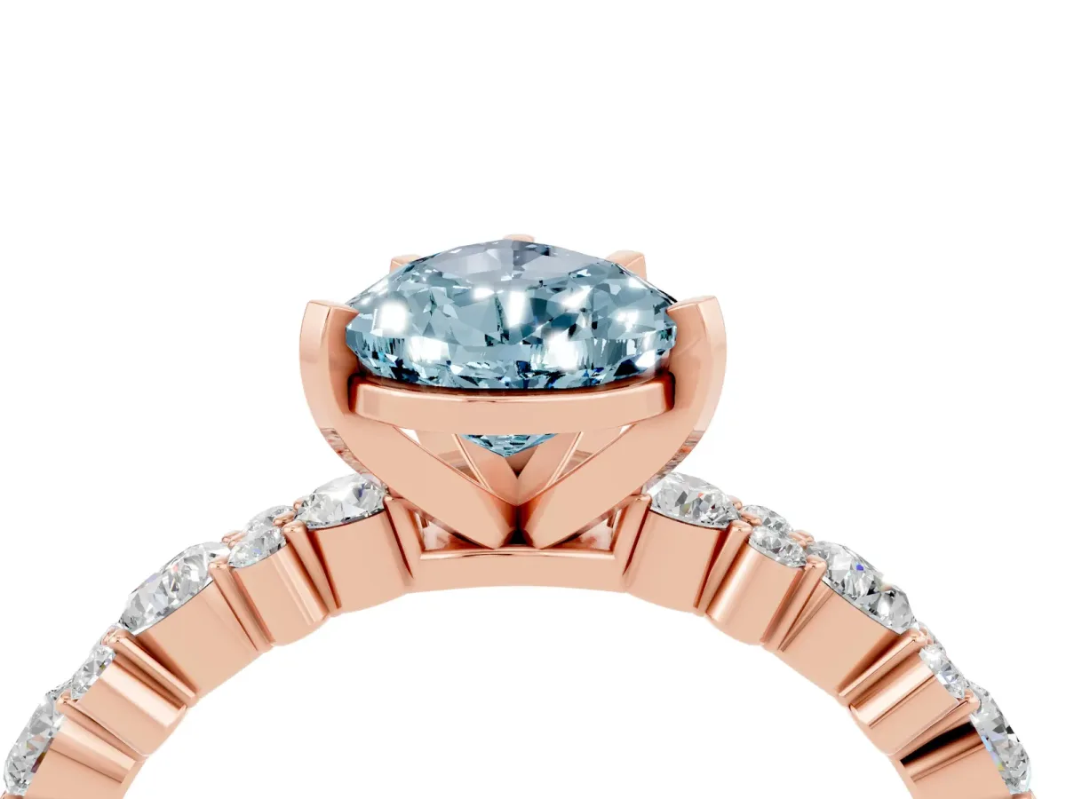 Pear Cut Aquamarine Side Stone Solitaire Ring with Round and Four-Prong Setting Rose gold