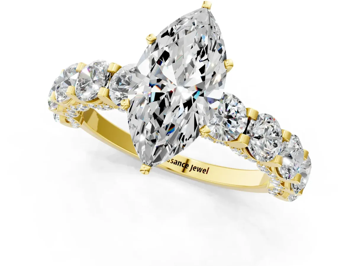 Marquise Cut Diamond Side Stone Engagement Ring with Four-Prong Setting Yellow gold